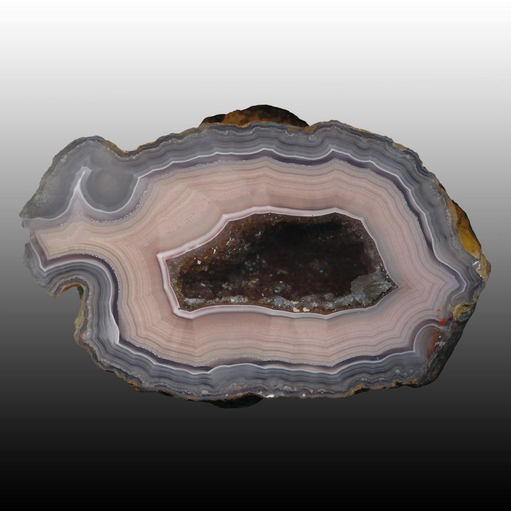 Fine Shadow Banding in this Arcoiris Laguna Agate Specimen with a druzy center. Pair to AG05176